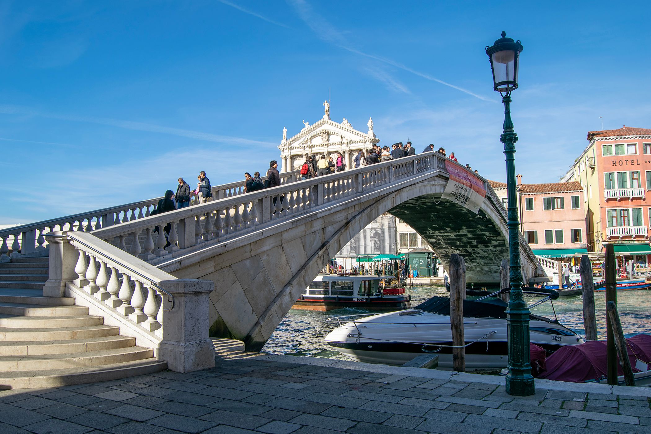 A picture of the stone bridge, Ponte degli Scalzi crossing the Grand Canal, Venice.