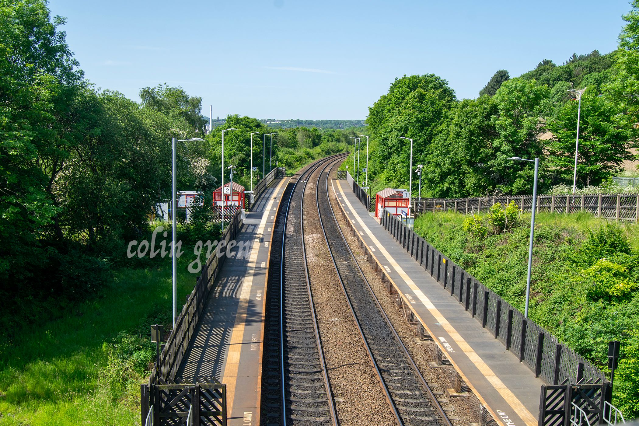 Image showing Deighton Railway Station, Huddersfield from the elevated position of the bridge nearby.