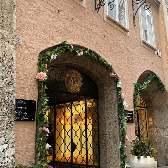 A Vintage Austrian Doorway: Herb-Adorned Tranquility